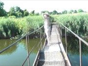 Messalina Dressed in Sun. Outside Outdoor. Nude Milf walks by bridge River. Naturist Nudist Woman 4/16