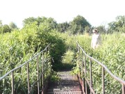 Messalina Dressed in Sun. Outside Outdoor. Nude Milf walks by bridge River. Naturist Nudist Woman 8/16