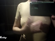 Alice in a beige suit sits in a bar walking down the street and posing near the mirror showing tits