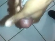 Masturbating