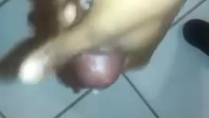 Masturbating