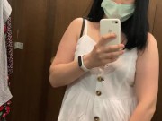 Pregnant beauty masturbates in a clothing store and tries on dresses