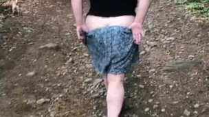 Big booty milf bare butt walking in the woods