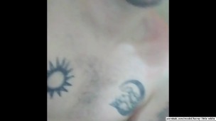 White tattooed boy plays with himself in the shower till cum