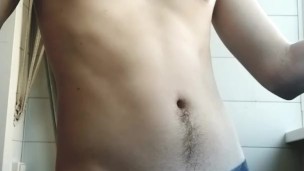 18 year old boy stands smoking in panties in college