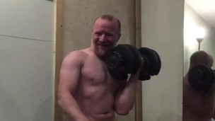 Muscle guy getting turned on pumping biceps with huge hard cock!