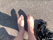 A Girl Walks In Nature In A Skirt And Massages Her Feet 3/16