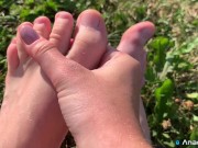 A Girl Walks In Nature In A Skirt And Massages Her Feet 9/16