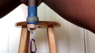 Hairy black dick and balls hanging penis weight with vacuum hanger.
