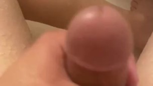 Jerking small pierced cock