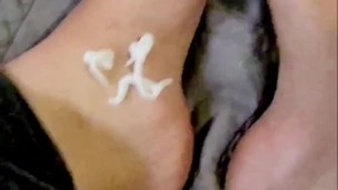 Squirting lotion on my feet and seductively massaging