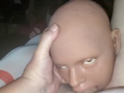 Doll giving head.