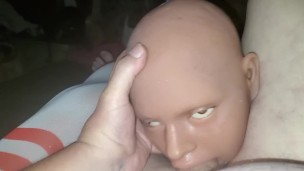 Doll giving head.