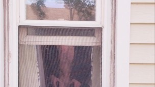 Neighbor Twink using dildo on ass and mouth in window