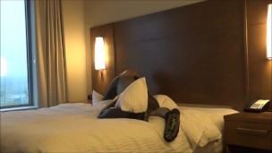 silicone masked wetsuited guy gets horny at hotel window and humps his pillows