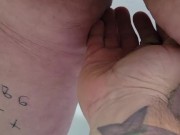 Submissive pisses on owners hand.    2/16