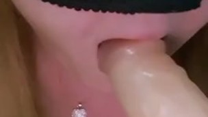 Close blowjob tease with dildo