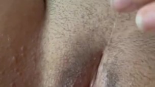 Horny girl with trimmed pussy edges herself 