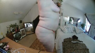 Blue eyed PAWG with huge butt strips down and gives a wet and gentle blowjob to a shy man.