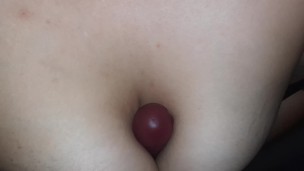 Playing with my tits with dildo