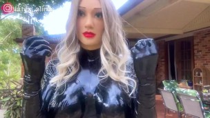 Real Rubber Doll Playing With Shiny Latex Gloves 