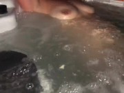 Sneak peak of my wife’s tits in our backyard hot tub tonight