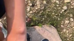 She held my cock for me to go pee on some bushes outside near a pond in the woods