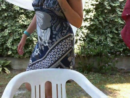 Wet girl in the backyard touches herself and makes your cock hard