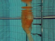 Nastya strips her clothes and shows naked hot body in the pool 1/16