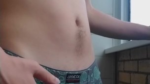 handsome guy in panties with a big standing cock spying on a neighbor
