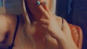 Big Ass tits smoking a cigarette outside 
