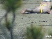 Mom undresses on the beach thinking that no one sees her 1/16