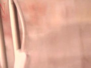 Stunning lady Regina Noir shows her pussy lying on the couch. 10/16