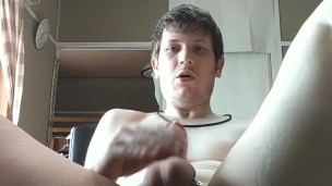 Cute boy plays with hIs cock on a chairtill he cums
