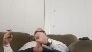 Dad stroking his cock and smoking