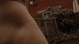Naked in the garden in view of neighbour