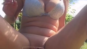 Dirty milf having Squirt orgasm in the garden.