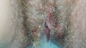 Huge special pissing menstrual cocktail from hairy pussy close up - Angel Fowler 