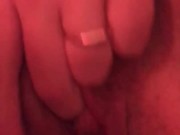 Masturbating