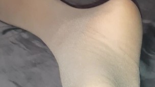 Ebony in shiny Nylons and so sexy wrinkled soles