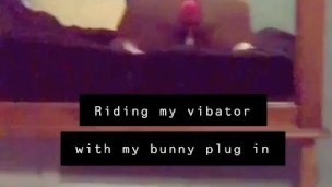 Fat girl riding vibrator with bunny ass plug