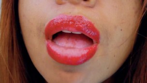 Sweet ebony MILF with glasses showing you her skills with that slutty red lips mouth she has