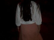 Naked girl walking in the city at night