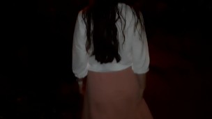 Naked girl walking in the city at night