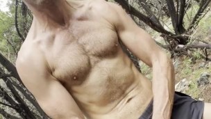 Cam Crest strips down and flexes his sweaty muscles outside
