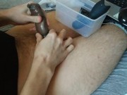 Cum no hands from a vibrator in a black condom 4/16