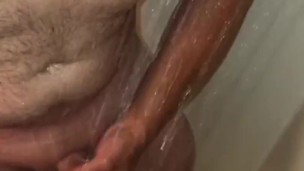 Hot Guy Showering Strokes His Cock Until He Shoots Out a Rope of Cum In Slow Motion & Samples Some