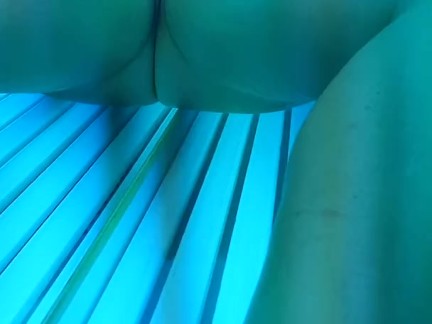 Wife playing with her self while in tanning bed