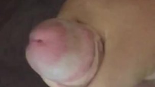 Jerking off quietly in the living room with people in the next room nice cum shot!