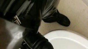 Sounding in latex shirt and pants